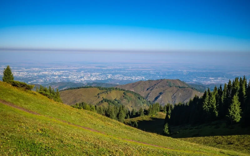 Almaty skyline and Tian Shan mountains, a main entry point for travellers from Kazakhstan visa-free countries